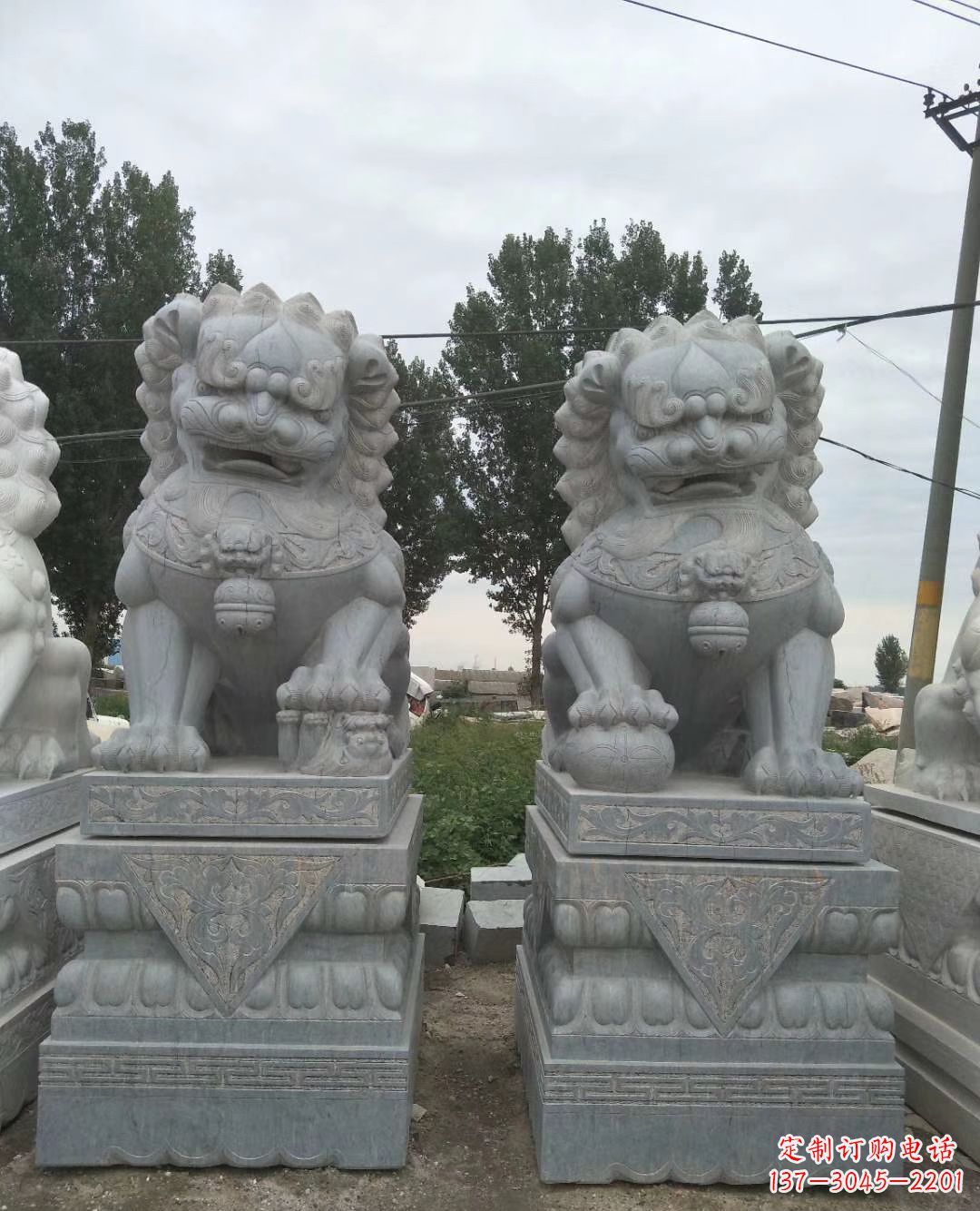 菏泽青石狮子象征力量的传统精灵