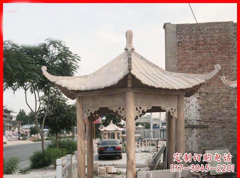 菏泽公园晚霞红六角石凉亭雕塑