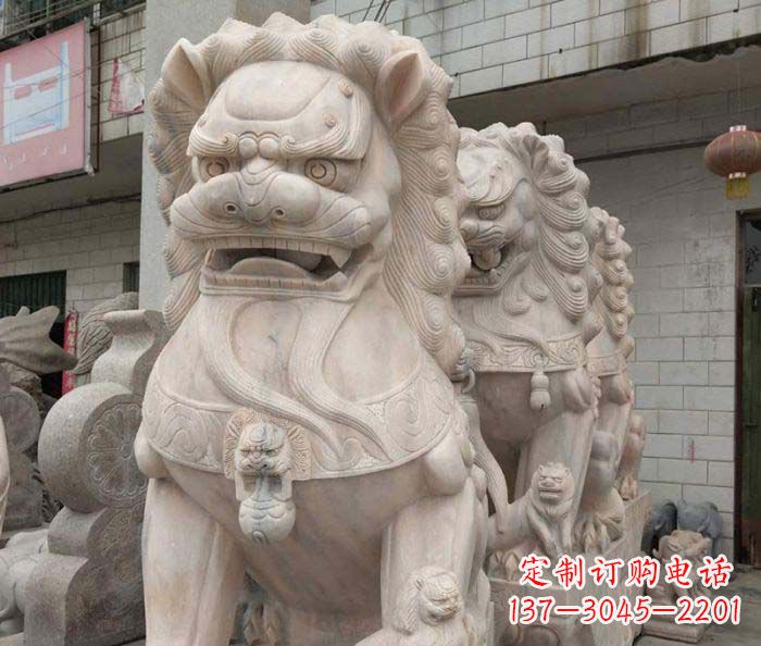 菏泽寺庙景观晚霞红狮子石雕