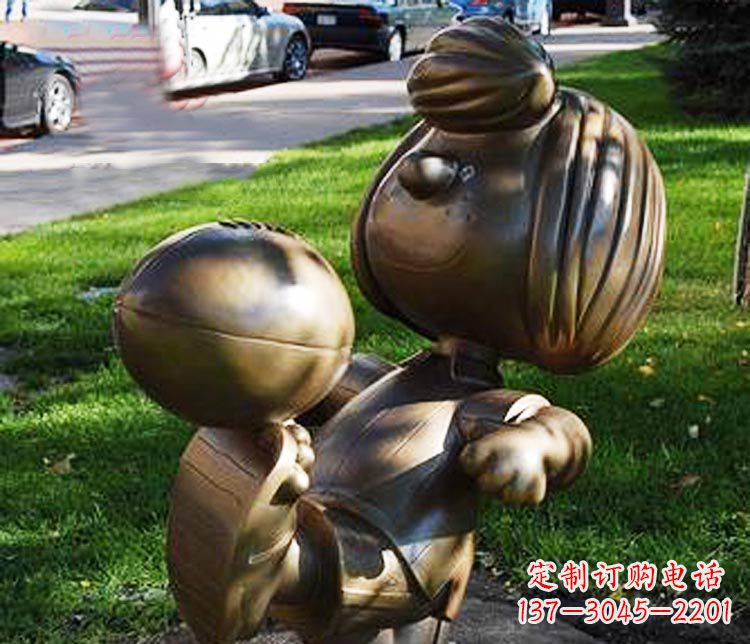 菏泽踢球的小女孩铜雕