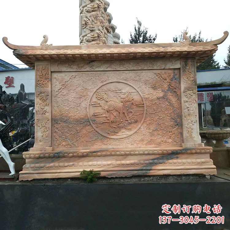 菏泽晚霞红麒麟影壁墙石雕