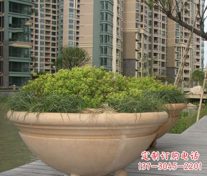 菏泽小区景观晚霞红花盆石雕