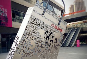 菏泽购物袋雕塑-步行街室外锻造刻字不锈钢购物袋雕塑